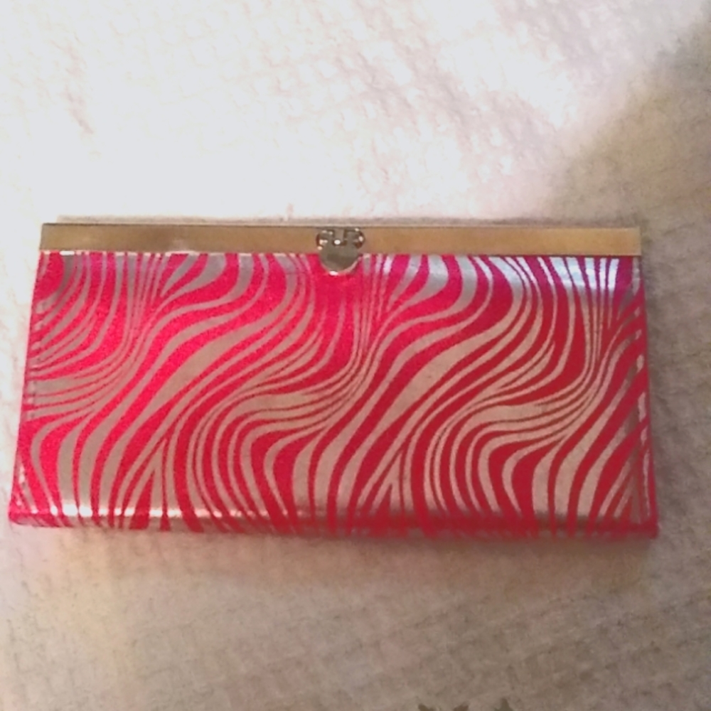 Amici clutch bag. Pink and gold with gold clasp.